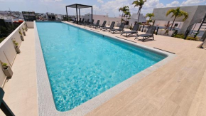 Fancy 3 BR Apartments in Downtown Playa Rooftop Pool Gym
